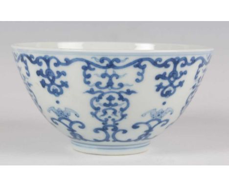 A Chinese blue and white porcelain bowl, mark of Guangxu and possibly of the period, of hemispherical form, the exterior deco
