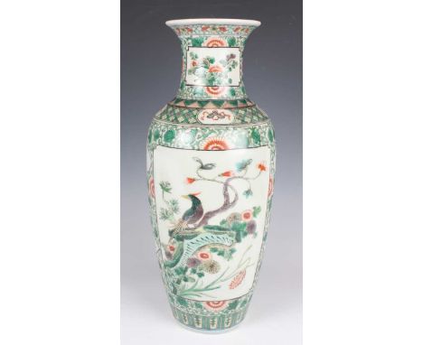 A Chinese famille verte porcelain vase, Kangxi style but late 19th century, the shouldered tapering body and flared neck pain