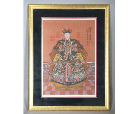 A Chinese ancestral style painting, 20th century, depicting an empress, seated wearing court dress, 65cm x 45cm, framed and g