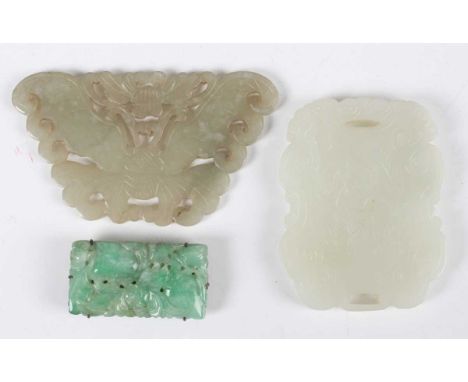 A Chinese pale celadon/white jade plaque pendant, late 19th/20th century, one side carved in low relief with an elephant, the