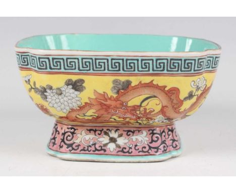 A Chinese Empress Dowager Cixi style yellow ground porcelain bowl, mark of Jiaqing but 20th century, the exterior painted wit