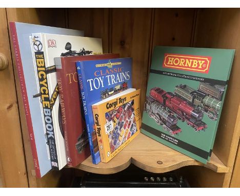 A quantity of good reference books on old toys including Corgi, hornby etc