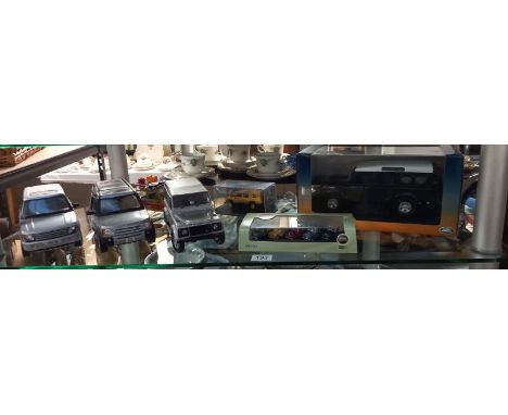 A quantity of diecast Land Rover and Range Rover models including Ertl, Burago, Corgi