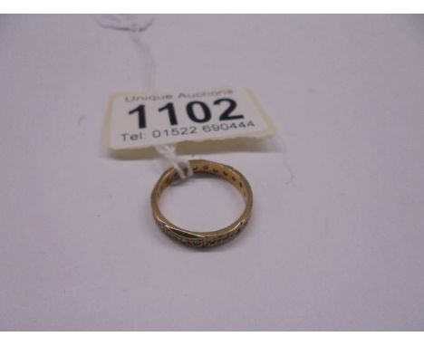 A gold eternity ring, size N half, 2.3 grams.