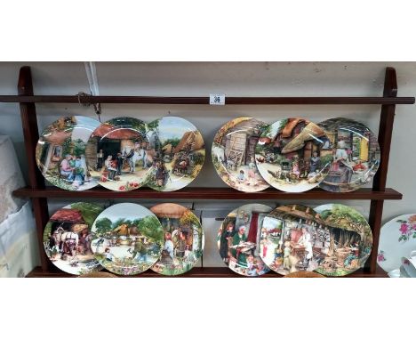 A set of 12 boxed Royal Doulton collectors plates 'Old country crafts' &amp; a display shelf.  COLLECT ONLY