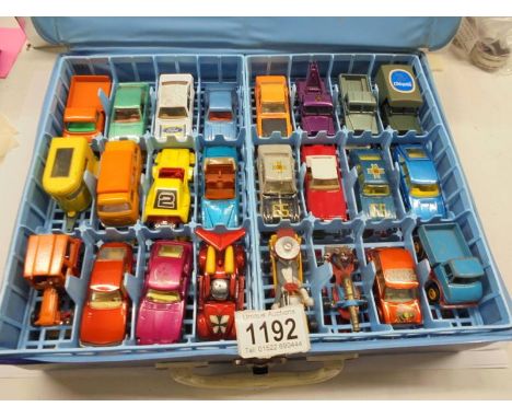 A Matchbox carry case with 48 cars including Corgi Juniors, most in very good condition.