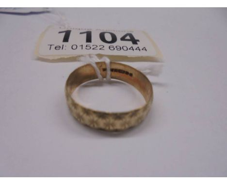 A gold wedding ring, size , 1.7 grams.