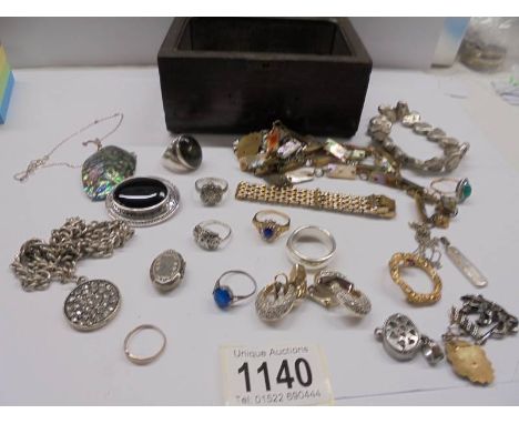 A quantity of jewellery in a lead lined antique oak box, silver items, rings, earrings, a gold ring approximately 25 items.