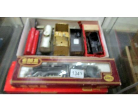 An Airfix Fowler BR engine and tender, Triang coach and Quantity of Hornby '0' gauge rolling stock.