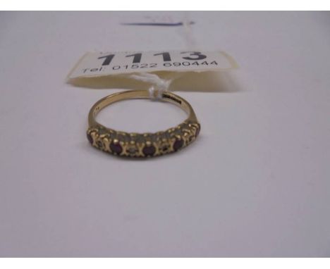 A Gold ring set red and white stones, size M, 1.4 grams.