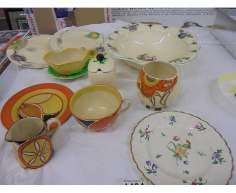 Seven pieces of Clarice Cliff (one a/f) and other ceramics.
