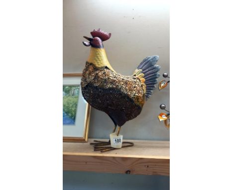 A full scale painted metal garden ornament of a cockerel