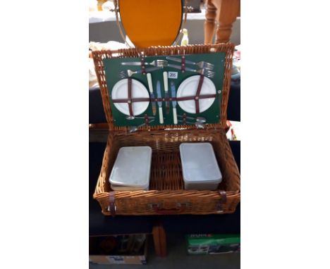 A vintage wicker picnic hamper