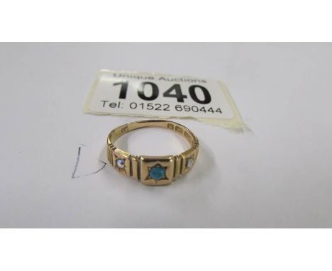An 18ct gold ring, size K half, 2.4 grams.The engraving/pattern only goes round the sides, approximately 1.5cm otherwise in g