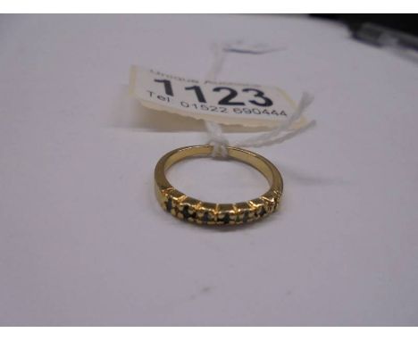 A unmarked ring&nbsp; (tests poss. 18ct) size K half, 1.6 grams.