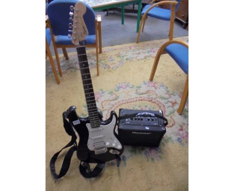 A Fender Squire S/N ICS 15082485 guitar with soft case, instruction books and Blackstar Amplifier, COLLECT ONLY.