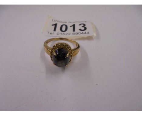 A yellow gold ring set large Cabachon, size T, 5 grams,