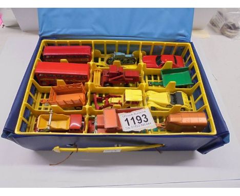 A Matchbox carry case with 24 Matchbox and Corgi Juniors, all in good condition.