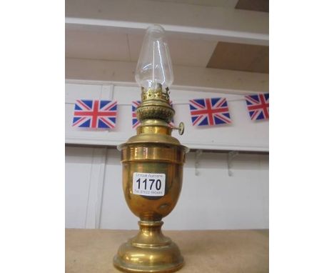 A late Victorian brass ships oil lamp, no bracket.