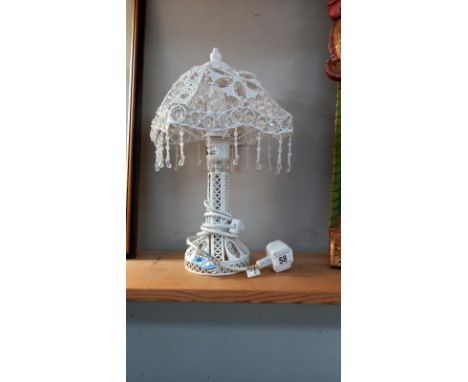 A glass &amp; metal decorative table lamp