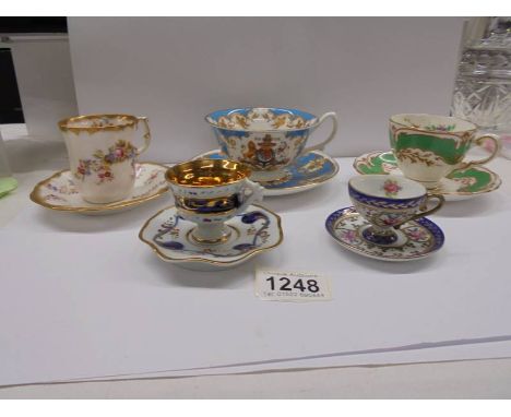 Five porcelain tea cups and saucers including circa 1920 Hammersley, Golden Jubilee etc.,