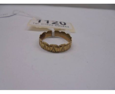 A unmarked ring (tests as 9ct) size p, 2.8 grams.