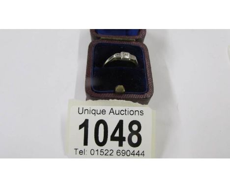 An 18ct gold ring size M, 1.9 grams.