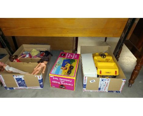 A boxed Sindy buggy with tent, wardrobe and box of clothing and dollsNo pen marks, surfaces dirty from age/use.Ginger doll is