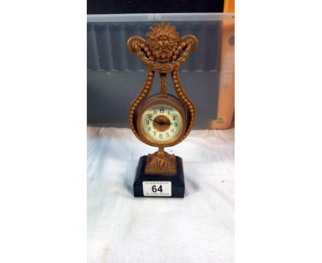 A gilt ormalu mantle clock