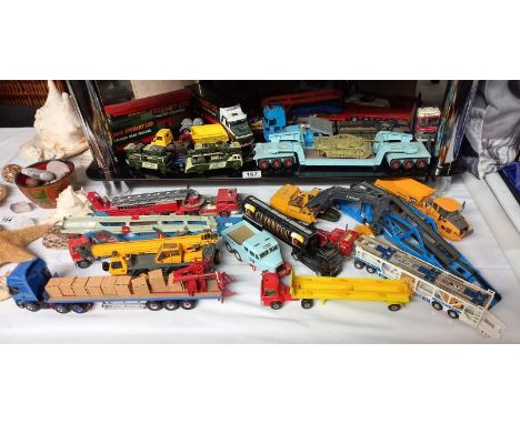 A good selection of unboxed diecast commercial vehicles including Corgi hevy haulage, Oxford diecast, Land Rover transporter 