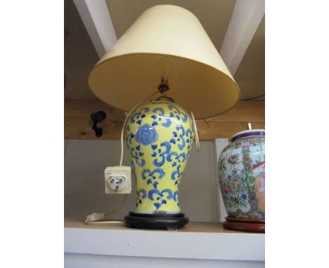 An oriental ceramic table lamp with shade. COLLECT ONLY.