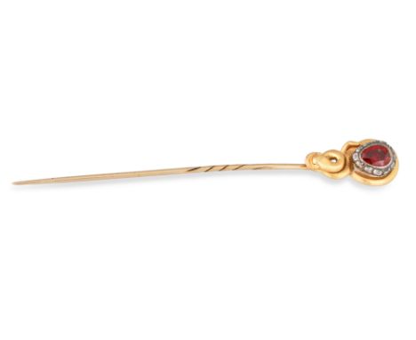 A VICTORIAN RUBY AND OLD CUT DIAMOND SET TIE PIN, in gold, modelled as a snake, cased, retailed by W.J. Weldon, Sloane St.