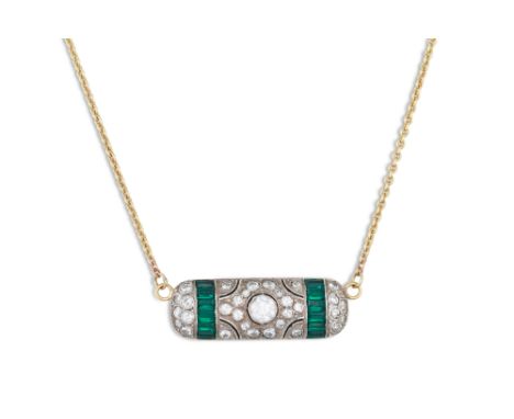 AN ART DECO DIAMOND AND EMERALD PENDANT, the centre diamond to diamond and baguette cut emerald surround, mounted in white go