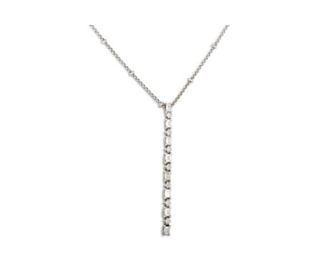 A DIAMOND SET PENDANT, set with a line of eight emerald cut diamonds interspersed with seven brilliant cut diamonds, suspende