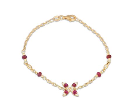 A RUBY AND DIAMOND BRACELET, set with beaded and faceted stones, in 18ct yellow gold