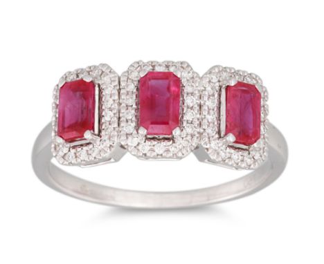 A THREE STONE RUBY AND DIAMOND CLUSTER RING, mounted in 18ct white gold, size N