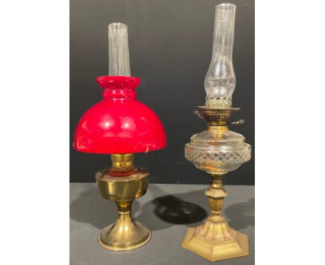 A Victorian brass and cut glass oil lamp, cut glass reservoir, hexagonal column, 62cm high; another 20th century, Aladdin, re