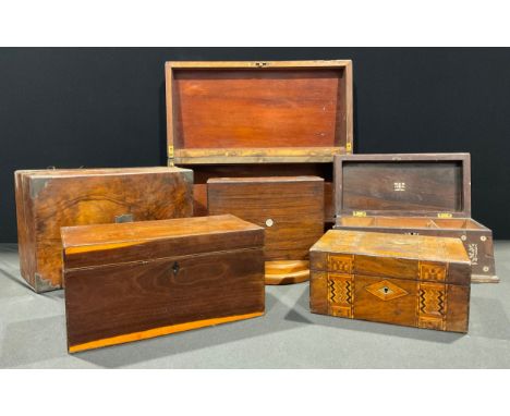 A 19th century rosewood and mother of pearl inlaid sarcophagus tea caddy, 34cm wide; another satinwood rectangular tea caddy;
