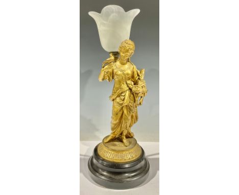A Victorian gilt spelter lamp, lady holding bird and nest 