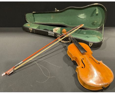 A cased violin and bow, Stradivarius label 