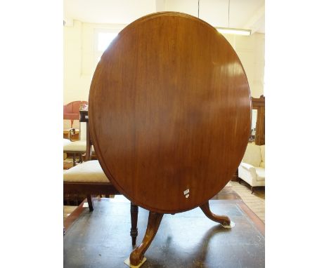 A Mahogany circular pedestal tripod table