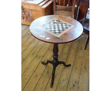 A Mahogany tripod table with inset chess board