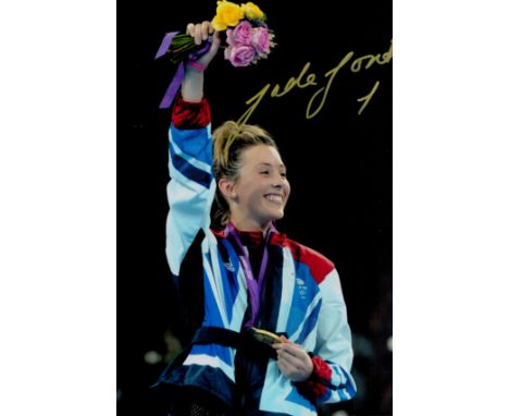 Olympics Jade Jones signed 12x8 colour photo pictured with her gold medal at the London 2012 games. Good condition. All autog