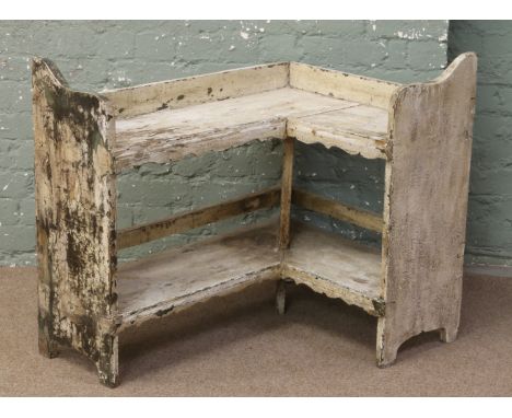 A vintage painted pine corner shelf.