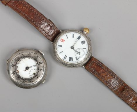 Two vintage silver cased manual wristwatches both with white enamel dials and subsidiary seconds. Condition Report. To be use