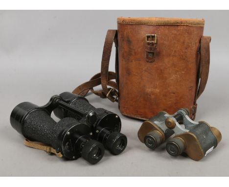 Two pairs of military issue binoculars including Ross London Bino Prism number 5 MK IV in original case, along with a Bausch 