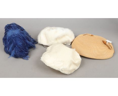 Four vintage ladies hats.