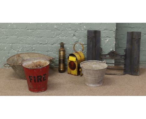 A collection of metalwares to include galvonised bath and bucket, East fire front road lamp, fire bucket and a early fire ext