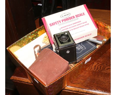 A small box of miscellaneous items to include Brownie model D camera, silver ferrel fish eaters, Royal Jubilee book and a set