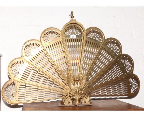 A brass peacock fire screen. Condition Report. To be used as a guide only. Good Condition